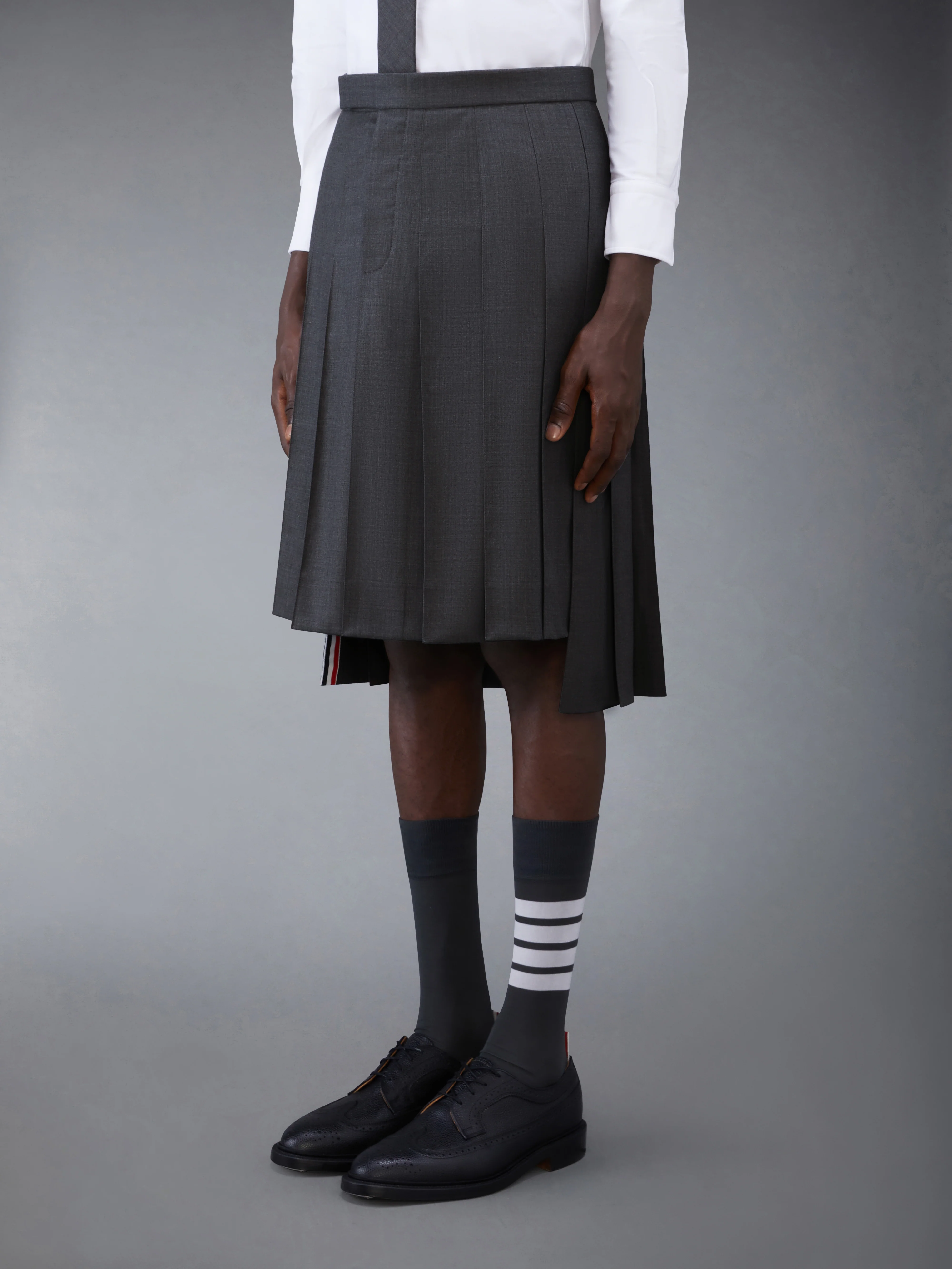 SUPER 120’S TWILL BACKSTRAP PLEATED SKIRT - Image 2