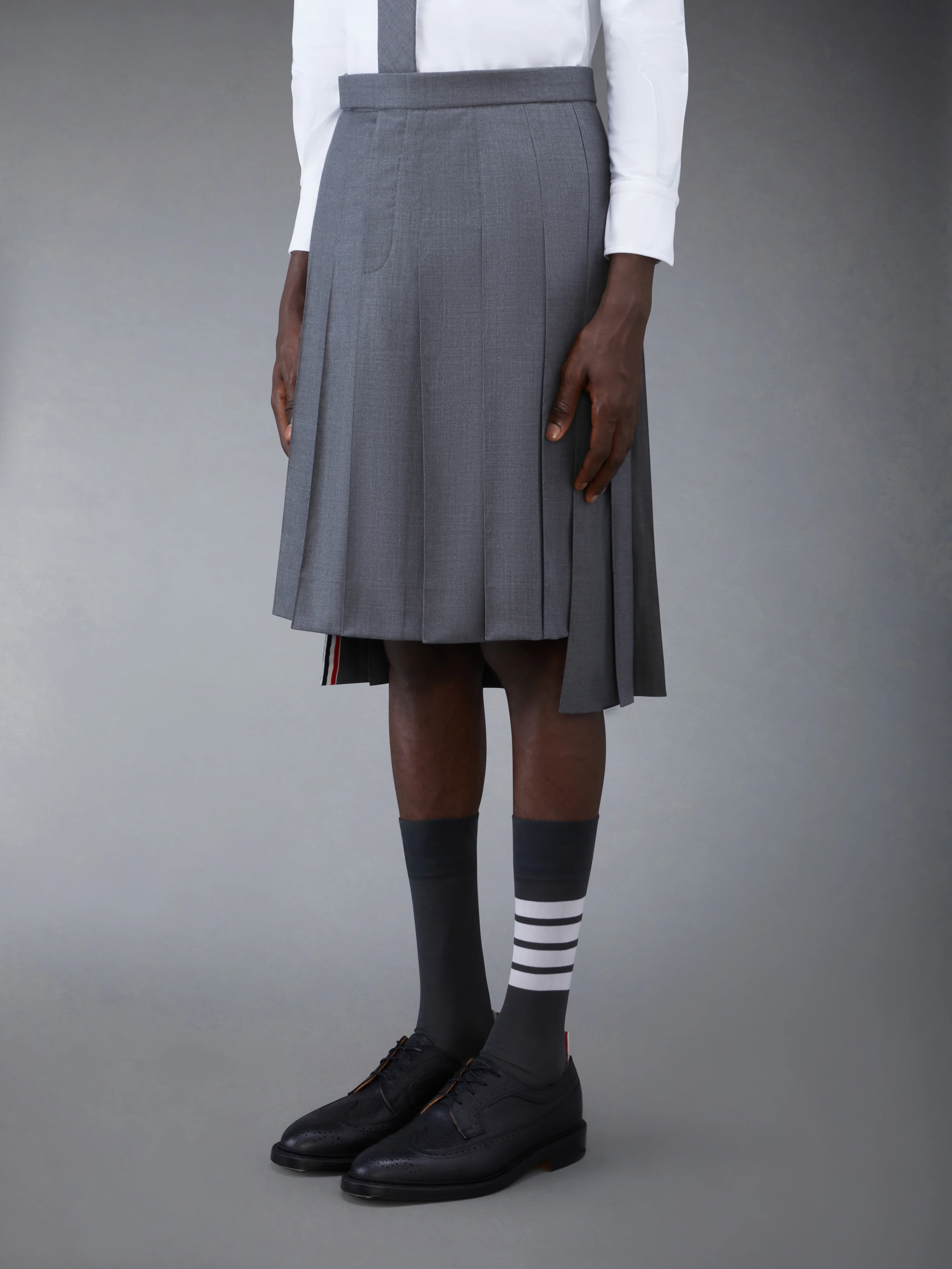 SUPER 120’S TWILL BACKSTRAP PLEATED SKIRT - Image 2